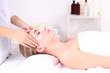 © Africa Studio - Beautiful young woman having head massage in spa salon