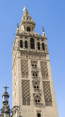 Wall Mural - Giralda tower, the belfry of the Cathedral of Sevilla