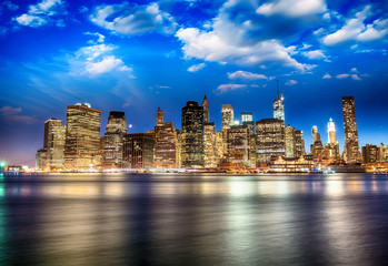 Spectacular sunset view of lower Manhattan skyline from Brooklyn