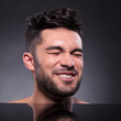 © Viorel Sima - head of a disgusted young man