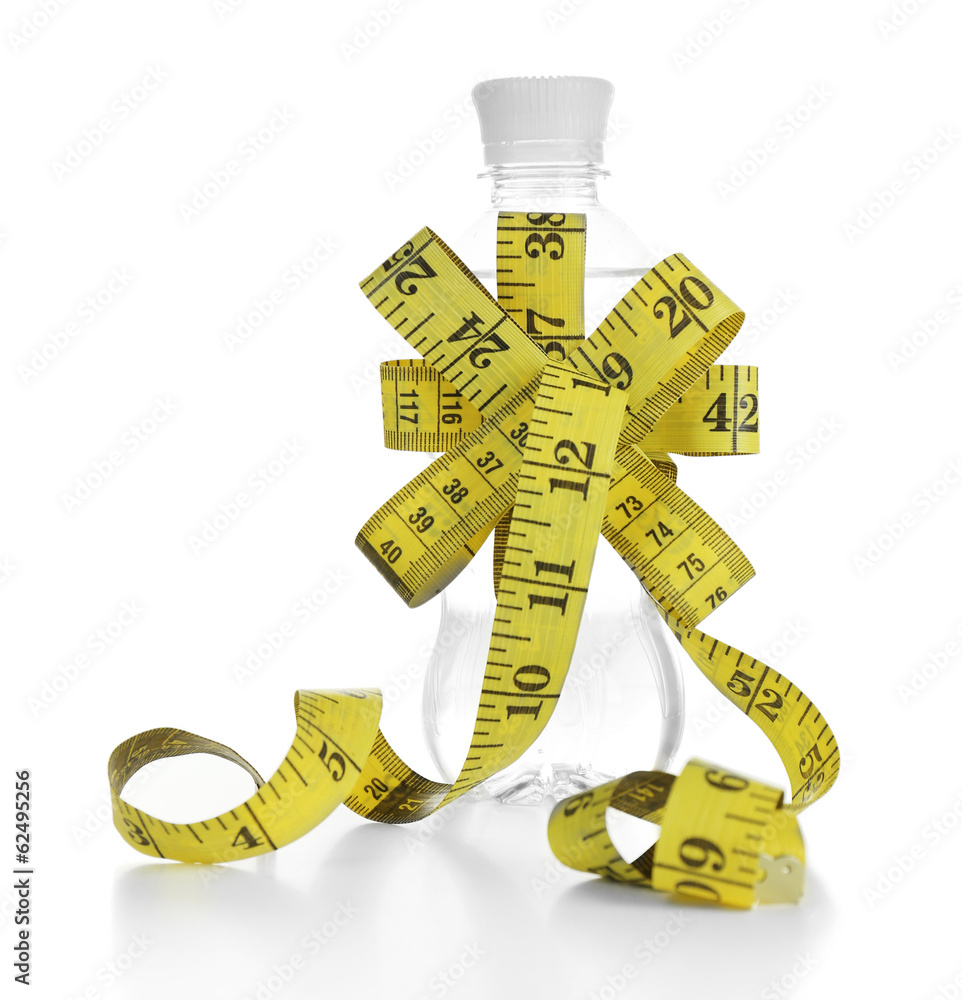 Bottle of water with measuring tape, isolated on white