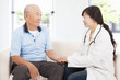 © Tom Wang - friendly doctor caring senior man indoor room