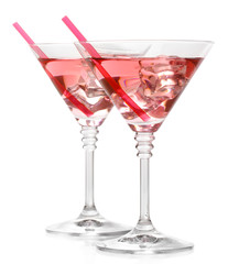 Wall Mural - Red cocktail in martini glasses isolated on white