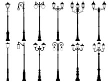 Set Of Vector Silhouettes Of Lamppost.