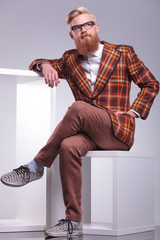 Wall Mural - fashion man in vintage clothes and long beard looking away