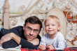 © natalinka29 - portrait of a father with his to kid at home