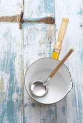 Wall Mural - yellow pan on old  blue wooden