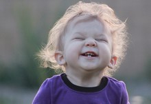 Little Baby Girl Smiling Laughing Having Fun 