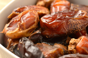 Wall Mural - A photo of a pile of dates in a bowl