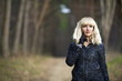 © Malyeuski Dzmitry - Beautiful young woman walks on autumn park