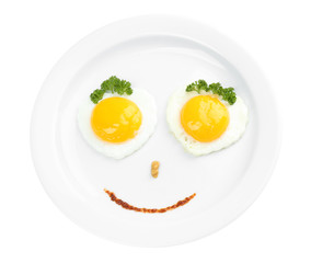 Scrambled eggs with bread on plate, on color napkin