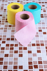 Wall Mural - Color toilet paper rolls on bright background