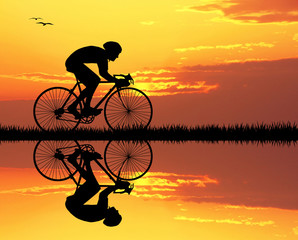 Wall Mural - Cyclist at sunset