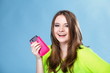 © Voyagerix - Happy girl with mobile phone in pink cover