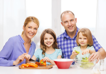 Poster - happy family with two kids making dinner at home