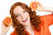 © GTeam - Portrait of a beautiful young woman with red hair oranges