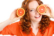 © GTeam - Portrait of a beautiful young woman with red hair oranges