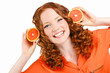 © GTeam - Portrait of a beautiful young woman with red hair oranges