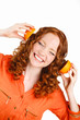 © GTeam - Portrait of a beautiful young woman with red hair oranges