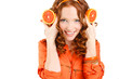 © GTeam - Portrait of a beautiful young woman with red hair oranges