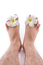 Isolated Of The Foot With Frangipani Flower In Spa On White Back