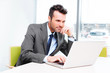 © baranq - Businessman in office working