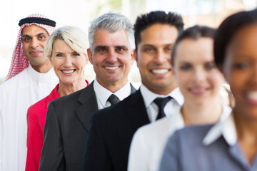 Wall Mural - middle aged businesswoman standing in a row