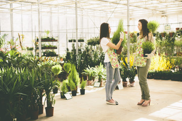 Young women in flower garden