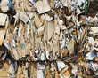 © Mint Images - Recycling facility with bundles of cardboard sorted and tied up for recycling.