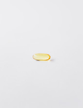 Fish Oil Providing Omega-3, In A Softgel Supplement Capsule, A Health Supplement And Fatty Acid Often Recommended For Health. 