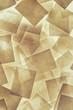 © Mint Images - Post it notes arranged and overlapping, above a light source.
