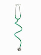 © Mint Images - A doctor's stethoscope with green tubing, a conceptual illustration of alternative medicine and wellbeing.