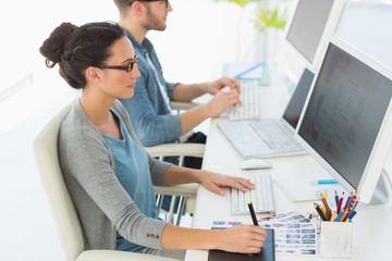 Sticker - Team of young designers working at their desk