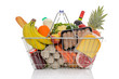 Shopping basket full of fresh food isolated on white.
