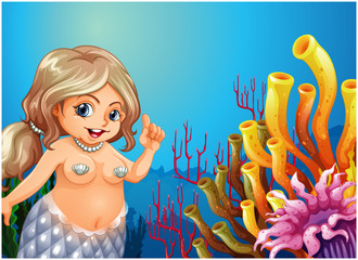 Wall Mural - A fat mermaid under the sea near the coral reefs