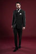 © ysbrandcosijn - Retro 1900 fashion man with beard wearing grey suit and black ti