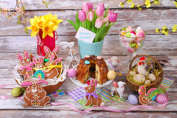 Wall Mural - easter table decoration with gingerbread cookies and ring cake