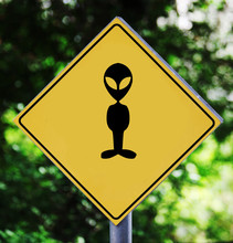 Yellow Traffic Label With Ufo Figure Pictogram