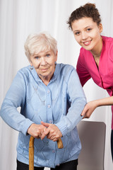 Wall Mural - Nurse with elderly woman