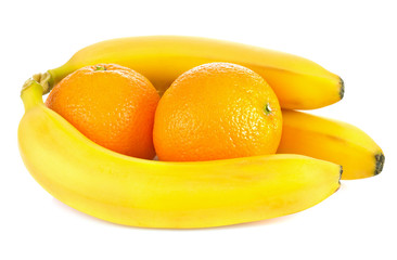 fresh ripe bananas and orange fruit isolated on white background