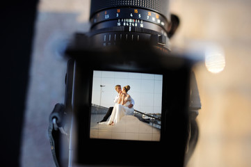 Wall Mural - Shooting a wedding with a vintage camera