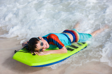 Poster - Boy swimming on boogie board