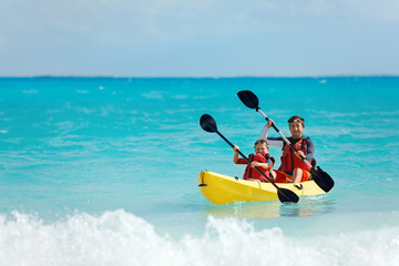 Canvas Print - Father and son kayaking