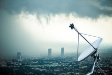 Antenna Communication Satellite Dish With Storm Background