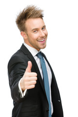 Wall Mural - Half-length portrait of businessman who thumbs up