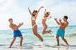 © juniart - young happy friends havin fun on the beach