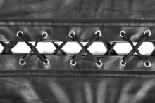 Leather Corset With A Lacing Background
