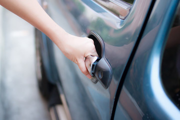 woman opening car