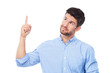 © pikselstock - Young man pointing up