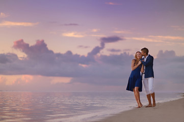 Beautiful romantic couple on a tropical beach